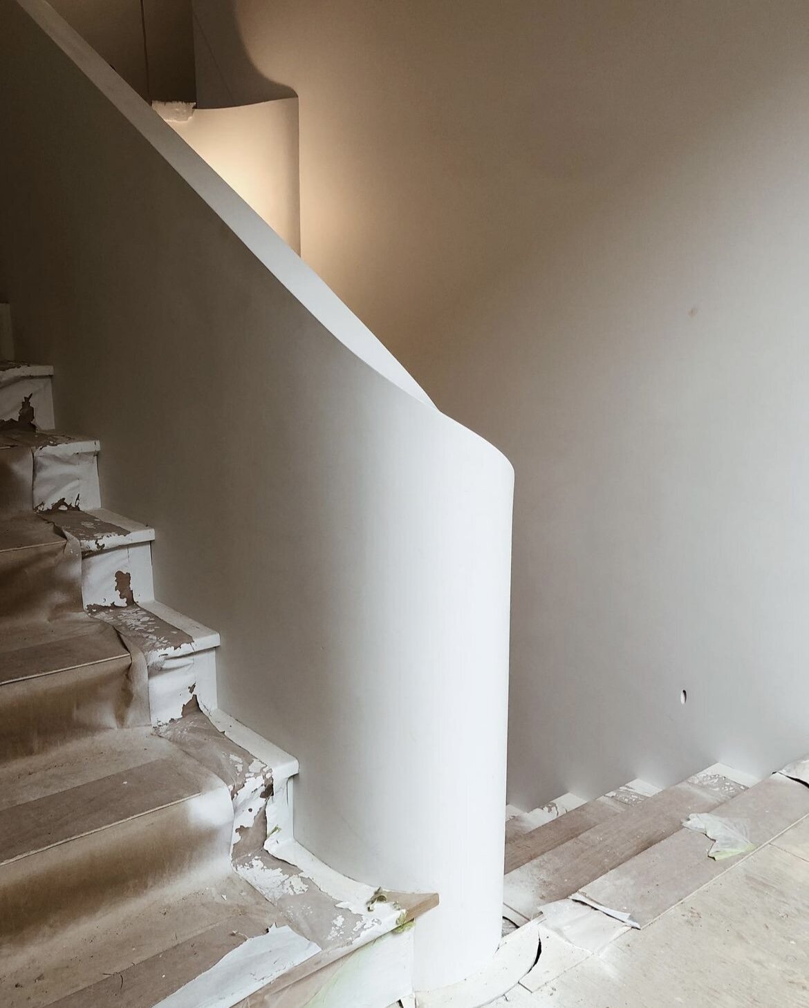 Sunlit staircase in a custom interior